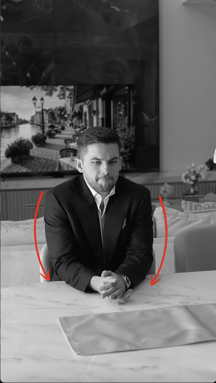 Closed, low-status body language